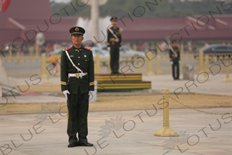 Soldiers Standing Guard at the Base of the Flagpole in Tiananmen Square in Beijing