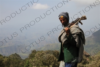 Man with AK-47 in Simien Mountains National Park