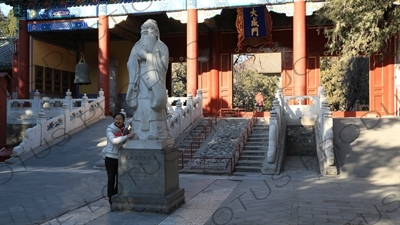 Statue of Confucius in front of the Gate of Great Success (Dacheng Men) in the Confucius Temple in Beijing