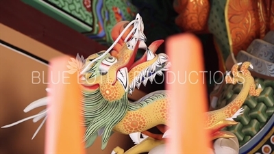 Dragon Carving on Statue of the Guardian Heavenly King of the West inside Cheonwang Gate (Cheonwangmun) at Beomeosa Temple in Busan