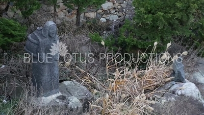 Statue in the 'Lucky Coin Divination' Area of Haedong Yonggung Temple (Haedong Yonggungsa) in Busan