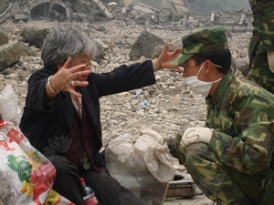 Soldier Helping an Elderly Resident After the Sichuan Earthquake