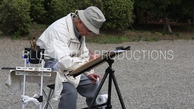 Artist Painting Trees in Shinjuku Gyoen National Park in Tokyo