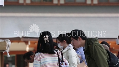 People Praying at the Yasukuni Shrine (Yasukuni-jinja) in Tokyo