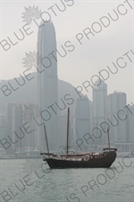 Junk Sailing through Hong Kong Harbour