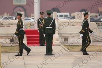 Soldiers Changing the Guard at the Base of the Flagpole in Tiananmen Square in Beijing