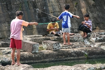 Boys Fishing near Prambanan Temple Compound near Yogyakarta