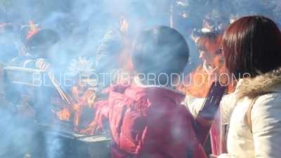 Incense Burning in front of the Gate of Peace and Harmony (Yonghe Men) in the Lama Temple in Beijing