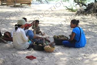 Pineapple Sellers on a Beach on Gili Meno