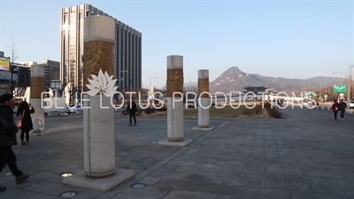 Columns behind King Sejong Statue and Gyeongbokgung Palace in Seoul