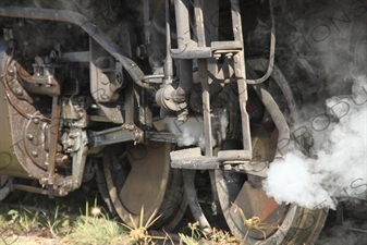 Steam Coming out from behind a Wheel on a Vintage Steam Engine Going from Asmara to Massawa