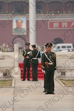 Soldiers Changing the Guard at the Base of the Flagpole in Tiananmen Square in Beijing