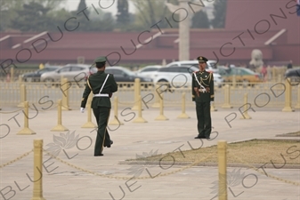 Soldiers Changing the Guard at the Base of the Flagpole in Tiananmen Square in Beijing