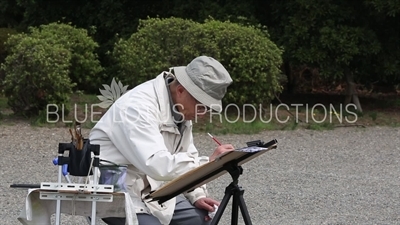 Artist Painting Trees in Shinjuku Gyoen National Park in Tokyo