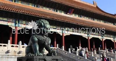 Guardian Lion with the Gate of Supreme Harmony (Taihe Men) in the Background in the Forbidden City in Beijing