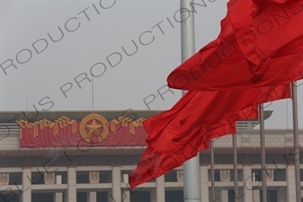 Red Flags and National Museum of China (Zhongguo Guojia Bowuguan) in Tiananmen Square in Beijing