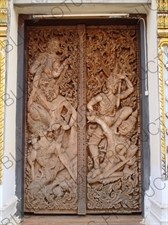 Carved Wooden Door in a Temple near the Mekong River