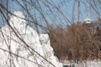 Snow Sculpture of Buddha in the Sun Island Scenic Area (Taiyang Dao) in Harbin