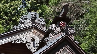 Demon Head Carvings on Roof of Arakura Sengen Shrine in Fujiyoshida