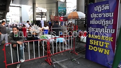 'Bangkok Shut Down' Sign next to a Barricade at Ratchaprasong Protest Camp in Bangkok