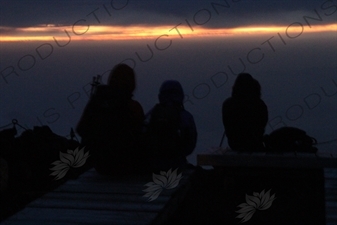 People Waiting for Sunrise at the Summit of Mount Fuji