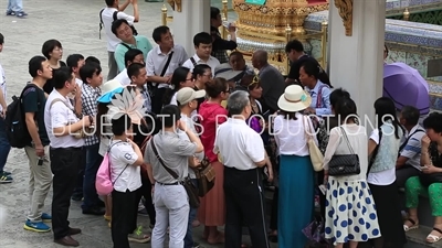 Tour Group outside the Ubosot at the Emerald Temple/Chapel (Wat Phra Kaew) at the Grand Palace (Phra Borom Maha Ratcha Wang) in Bangkok