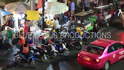Motorcycle Taxis in front of Siam BTS Station in Bangkok