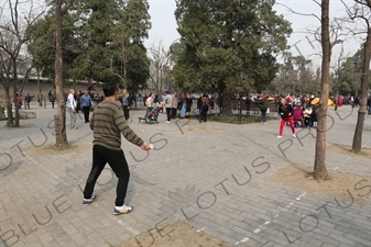 People Playing Badminton near the North Gate of the Temple of Heaven (Tiantan) in Beijing