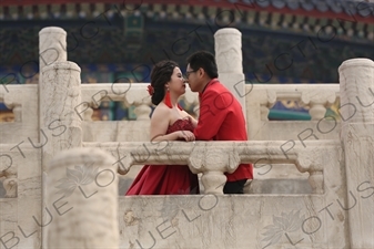 Married Couple Getting Their Picture Taken in the Hall of Prayer for Good Harvests (Qi Nian Dian) compound in the Temple of Heaven (Tiantan) in Beijing