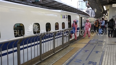 Cleaners Entering Bullet Train (Shinkansen) in Tokyo Station