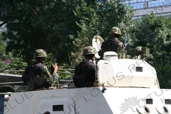 Chinese People's Armed Police Force/PAP (Zhongguo Renmin Wuzhuang Jingcha Budui/Wujing) Officers in an Armoured Personnel Carrier in Urumqi