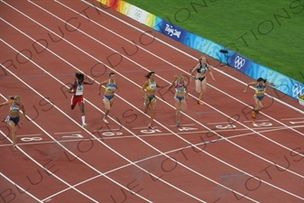 Athletes at the End of a Women's 100 Metres Heat in the Bird's Nest/National Stadium (Niaochao/Guojia Tiyuchang) in the Olympic Park in Beijing