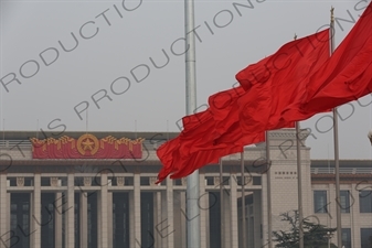 Red Flags and National Museum of China (Zhongguo Guojia Bowuguan) in Tiananmen Square in Beijing