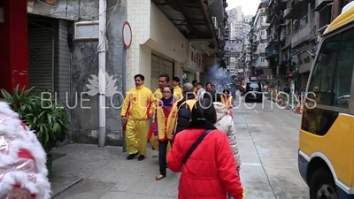 Lion Dance Procession with Firecrackers in Macau