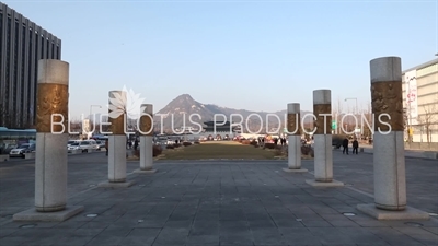 Columns behind King Sejong Statue and Gyeongbokgung Palace in Seoul