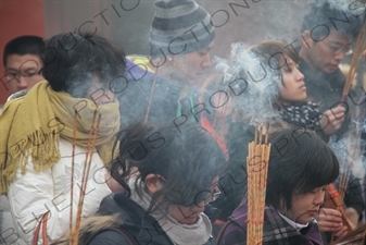 People Burning Incense in the Lama Temple (Yonghegong) in Beijing