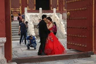 Married Couple Getting Their Picture Taken in the Hall of Prayer for Good Harvests (Qi Nian Dian) Compound in the Temple of Heaven (Tiantan) in Beijing