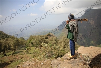 Man with AK-47 in Simien Mountains National Park