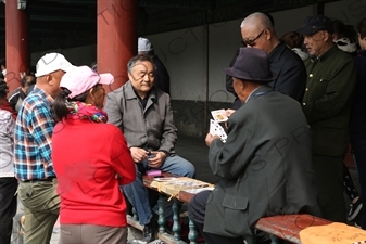 People Playing Cards in the Long Corridor (Chang Lang) in the Temple of Heaven (Tiantan) in Beijing