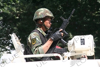 Chinese People's Armed Police Force/PAP (Zhongguo Renmin Wuzhuang Jingcha Budui/Wujing) Officer in an Armoured Personnel Carrier in Urumqi