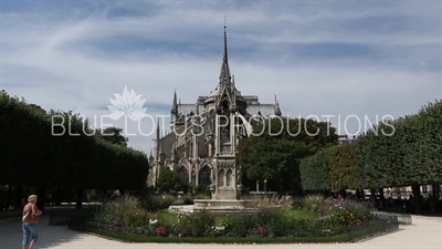 Notre-Dame and Fountain of the Virgin (Fontaine de la Vierge) in Paris