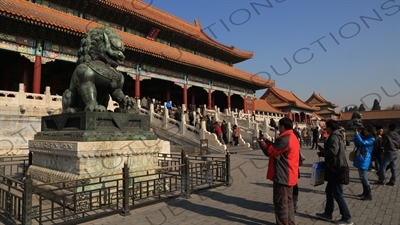 Guardian Lion in front of the Gate of Supreme Harmony (Taihe Men) in the Forbidden City in Beijing