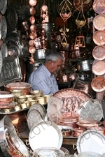 Man Selling Kitchenware in a Market in Esfahan/Isfahan