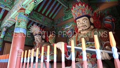 Statues of the Guardian Heavenly Kings inside Cheonwang Gate (Cheonwangmun) at Beomeosa Temple in Busan