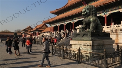 Guardian Lion in front of the Gate of Supreme Harmony (Taihe Men) in the Forbidden City in Beijing