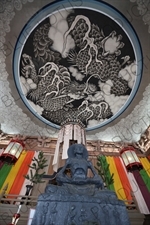 Interior of the Hatto with a Buddha Statue and the Dragon Ceiling in Kencho-ji in Kamakura