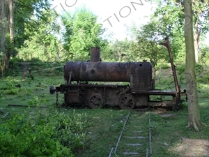 Small, Rusted, Steam Engine near the Mekong River