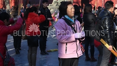 Incense Burning in front of the Gate of Peace and Harmony (Yonghe Men) in the Lama Temple in Beijing