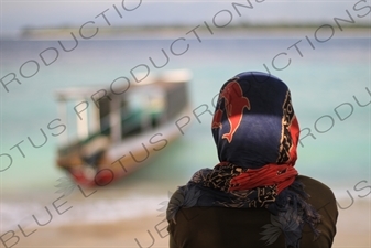 Person on a Beach on Gili Meno