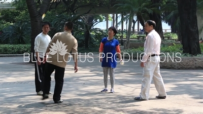 People Playing Shuttlecock (Jianzi/Ti Jianzi/Jianqiu) in a Park in Guangzhou